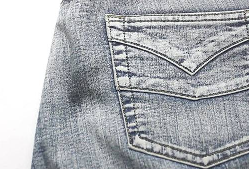 Масляна пляма на джинсах